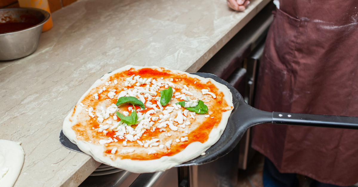 Pizzaliefhebbers opgelet_ leer hoe je de beste pizza uit een pizzaoven maakt!
